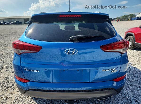 KM8J3CA22GU184515 2016 HYUNDAI TUCSON Blue Front interior view