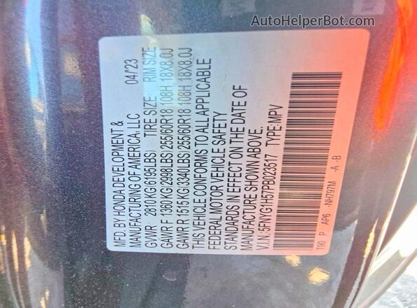 5FNYG1H57PB023517 2023 HONDA PILOT Gray Widok wnętrza z tyłu
