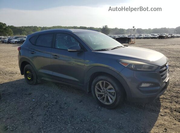 KM8J33A23GU101822 2016 HYUNDAI TUCSON Gray Widok z przodu