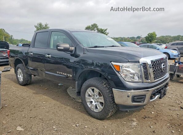1N6AA1E5XJN546768 2018 NISSAN TITAN Black Front view