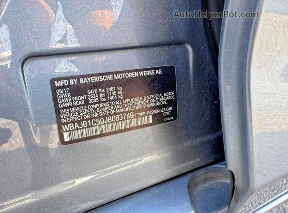 WBAJB1C50JB083749 2018 BMW 5 SERIES Charcoal Vista interior trasera