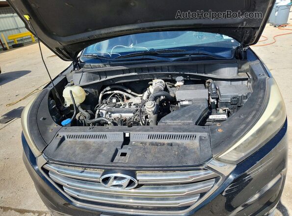 KM8J33A2XGU200296 2016 HYUNDAI TUCSON Black ძრავის განყოფილების ხედი
