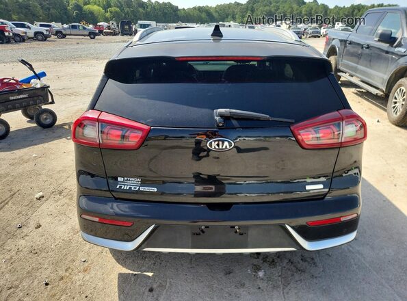 KNDCE3LC7H5046946 2017 KIA NIRO Черный Вид салона спереди