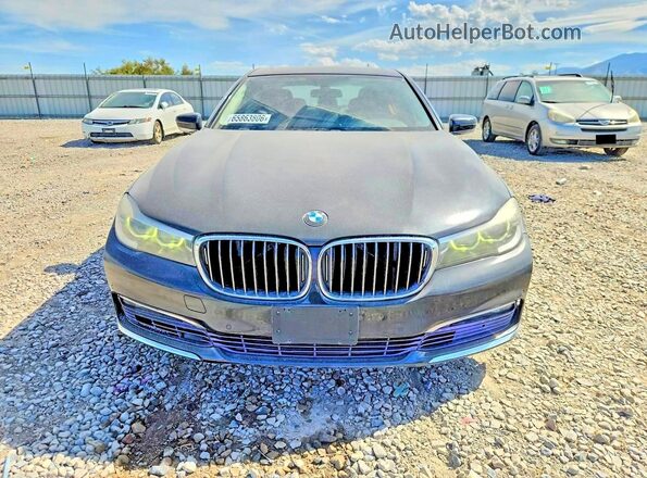WBA7E2C50GG546685 2016 BMW 7 SERIES Black Rear view