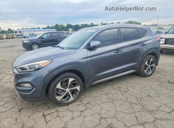 KM8J3CA22HU265032 2017 HYUNDAI TUCSON Gray უკანა მარცხენა