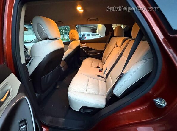 5XYZUDLB5GG377024 2016 HYUNDAI SANTA FE Red Вид задньої частини салону
