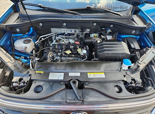 1V2HE2CA2RC234378 2024 VOLKSWAGEN ATLAS Blue Vista del compartimento del motor