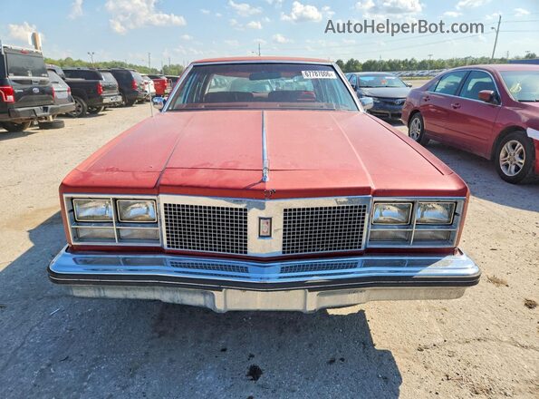 3X69K7M439786 1977 OLDSMOBILE 98 Красный Вид сзади