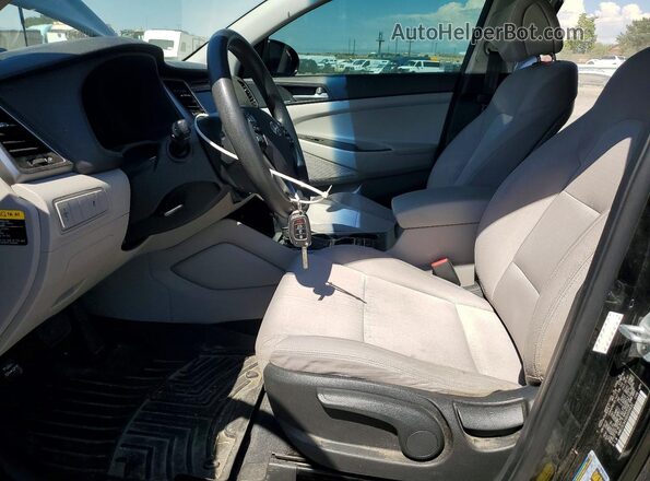 KM8J3CA45GU035632 2016 HYUNDAI TUCSON Black Dashboard view