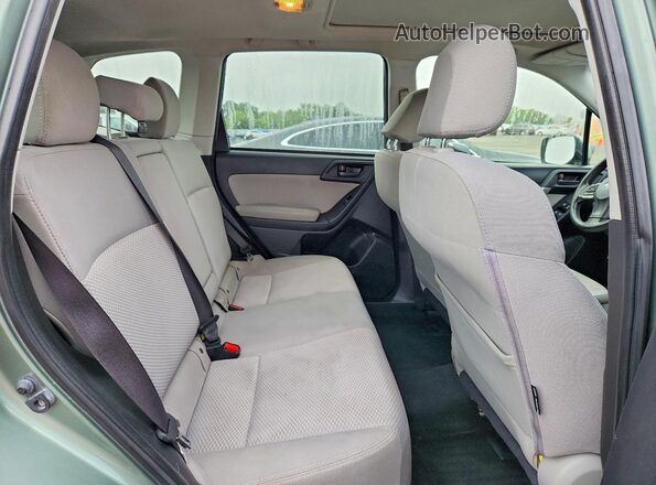 JF2SJADC2GH407007 2016 SUBARU FORESTER Green Rear interior view