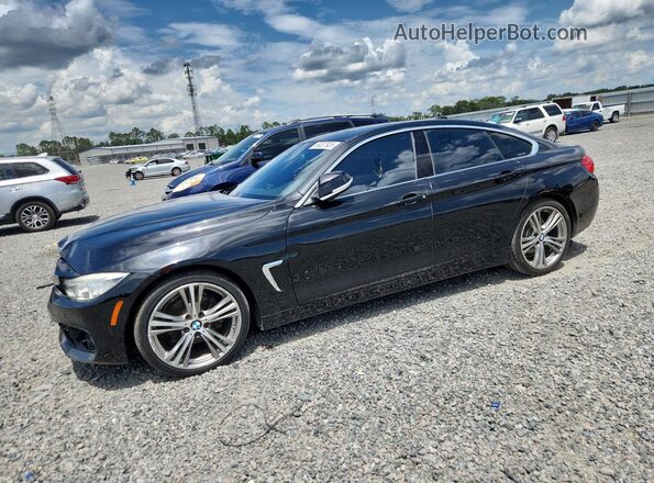 WBA4A9C5XGG506136 2016 BMW 4 SERIES Black Tył lewy