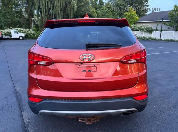 5XYZUDLB5GG377024 2016 HYUNDAI SANTA FE Red Вид салону спереду