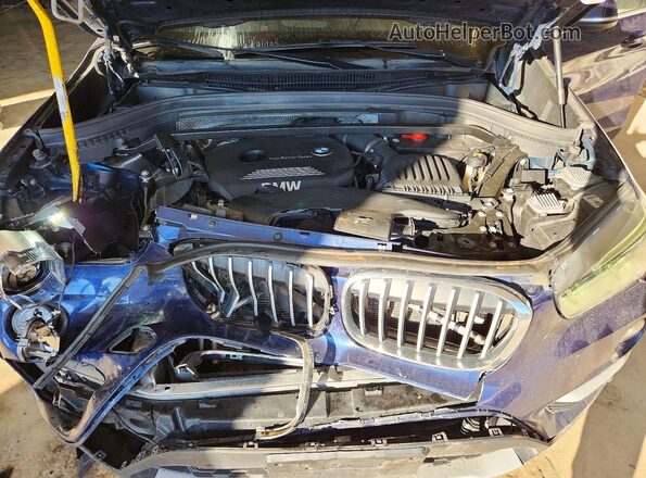 WBXHT3C32GP883105 2016 BMW X1 Blue Вид наклейки з VIN-кодом