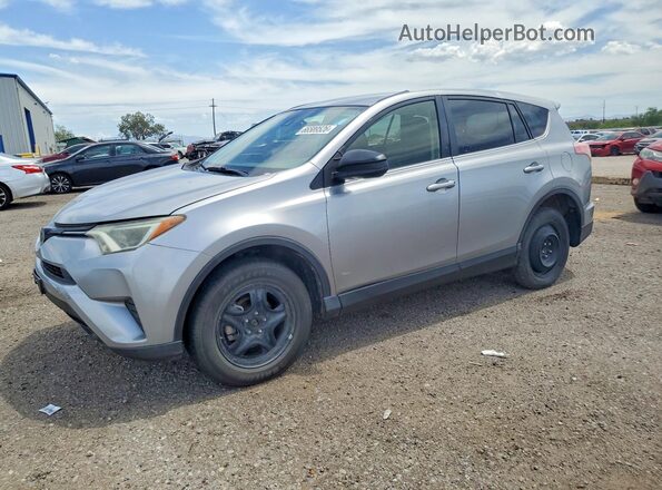 JTMZFREV3JD128256 2018 TOYOTA RAV4 Silver Tył lewy