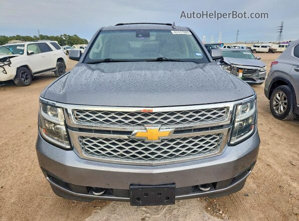 1GNSCHKC1KR262282 2019 CHEVROLET SUBURBAN Серебряный Вид сзади