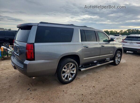 1GNSCHKC1KR262282 2019 CHEVROLET SUBURBAN Серебряный Передняя правая четверть