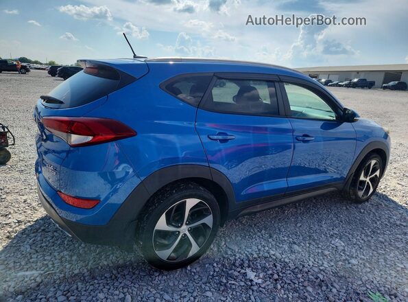KM8J3CA22GU184515 2016 HYUNDAI TUCSON Blue Front right