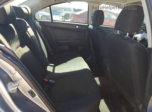 JA32U2FU0GU002514 2016 MITSUBISHI LANCER Gray Vista de los asientos traseros