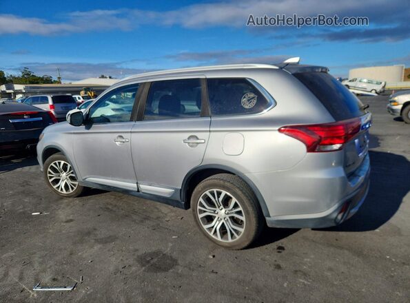 JA4AD3A32JJ005371 2018 MITSUBISHI OUTLANDER Silver Trasero izquierdo