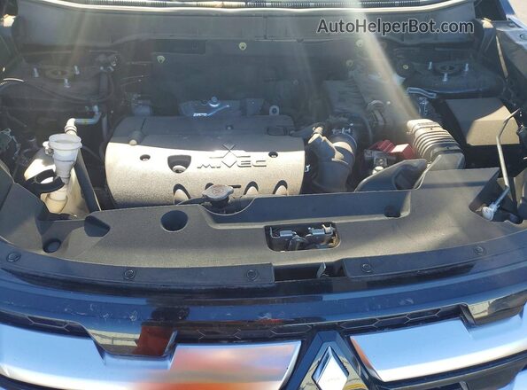 JA4APVAU0MU013631 2021 MITSUBISHI OUTLANDER Black Rear interior view