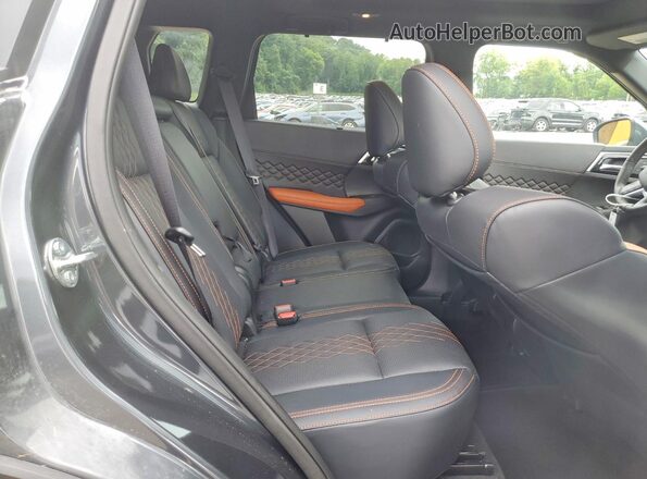 JA4T5WA99SZ042299 2025 MITSUBISHI OUTLANDER Black უკანა სალონის ხედი
