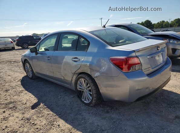 JF1GJAF64GH017057 2016 SUBARU IMPREZA Silver Задня ліва чверть