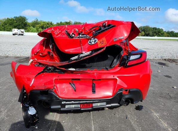 JF1ZNBE15T8076475 2026 TOYOTA GR86 Red Հետևի տեսք