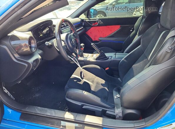 JF1ZNBE18P9754667 2023 TOYOTA GR Blue Widok wnętrza z przodu