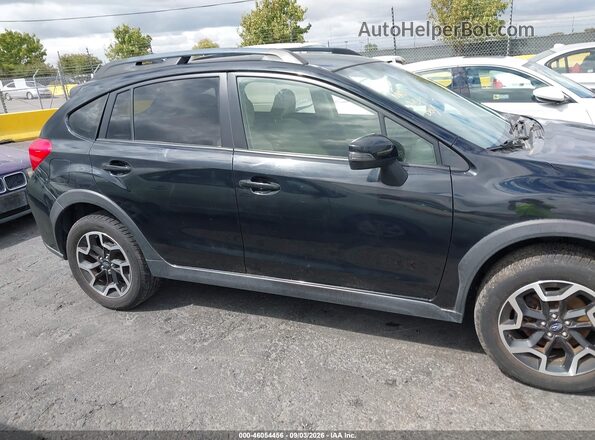 JF2GPANC1G8210784 2016 SUBARU CROSSTREK Black Widok wnętrza z tyłu