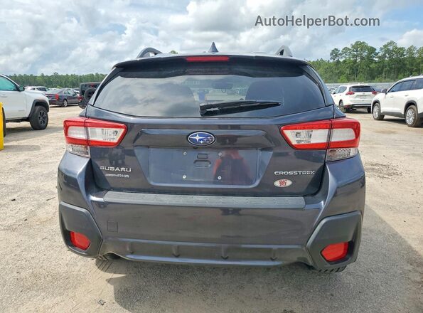 JF2GTABC9J8214590 2018 SUBARU CROSSTREK Gray Rear view