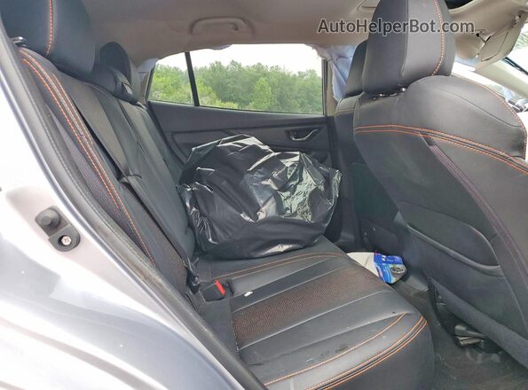 JF2GTHMC4PH251156 2023 SUBARU CROSSTREK Silver Rear interior view
