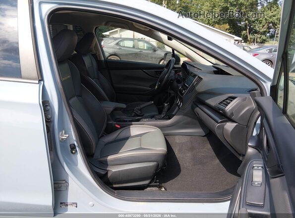 JF2GTHRC5MH298328 2021 SUBARU CROSSTREK Light Blue Widok wnętrza z przodu