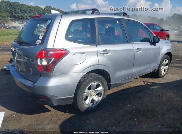 JF2SJAACXGG400879 2016 SUBARU FORESTER Silver Trasero derecho