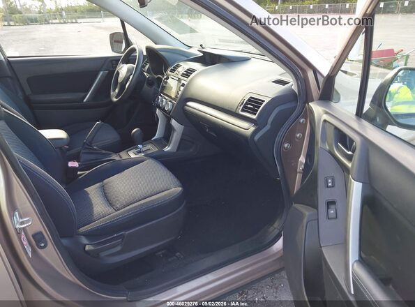 JF2SJADC0GH431175 2016 SUBARU FORESTER Gold Вид салону спереду