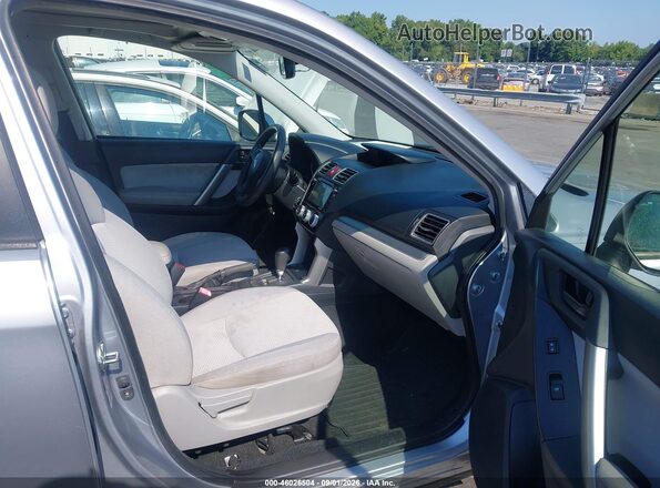 JF2SJADC2GH528670 2016 SUBARU FORESTER Silver Front interior view