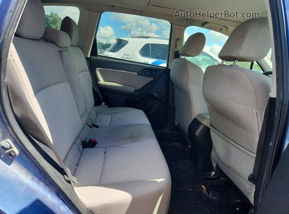 JF2SJADC4GH528010 2016 SUBARU FORESTER Blue Rear interior view