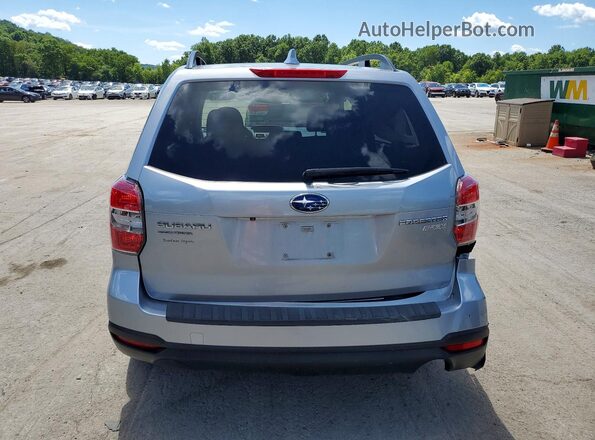 JF2SJADC9GH479824 2016 SUBARU FORESTER Silver Vista trasera