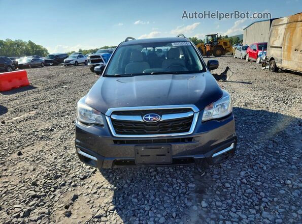 JF2SJAEC5JH504224 2018 SUBARU FORESTER Black Front view