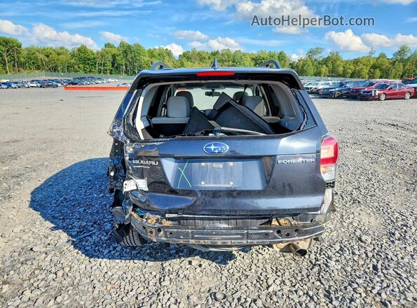 JF2SJAEC5JH504224 2018 SUBARU FORESTER Black Rear view