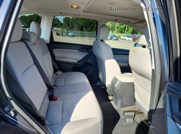 JF2SJAEC5JH504224 2018 SUBARU FORESTER Black Rear seats view