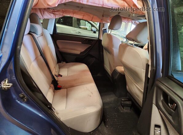 JF2SJAGC7JH504481 2018 SUBARU FORESTER Blue Rear interior view