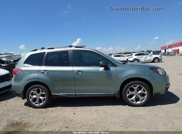 JF2SJAWCXJH512382 2018 SUBARU FORESTER Green Vista interior trasera
