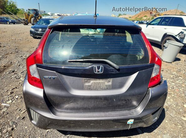 JHMGK5H56HS011041 2017 HONDA FIT Gray Widok z tyłu
