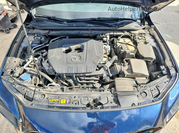 JM1BPAKM5S1770928 2025 MAZDA 3 Blue Rear interior view