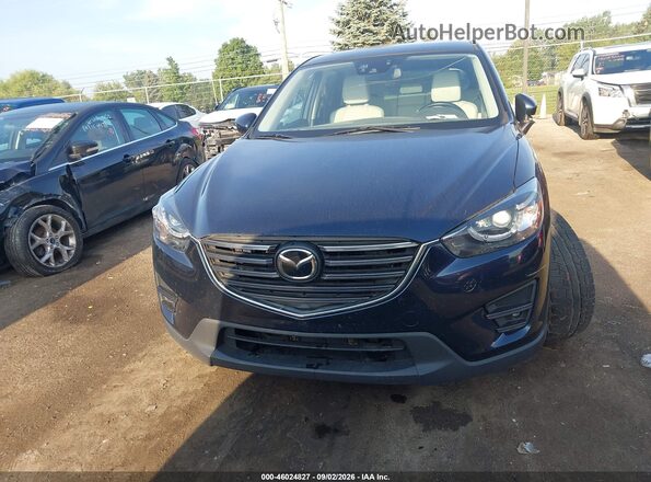 JM3KE4DY6G0612917 2016 MAZDA CX-5 Dark Blue Սալոնի հետևի տեսք