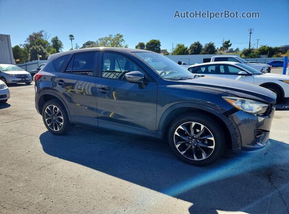 JM3KE4DY8G0614703 2016 MAZDA CX-5 Черный Передняя правая четверть