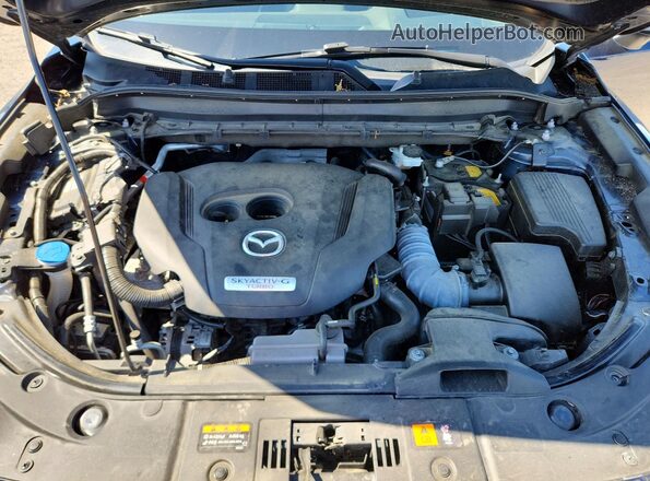 JM3KFBAY5P0108882 2023 MAZDA CX-5 Blue Vista interior trasera
