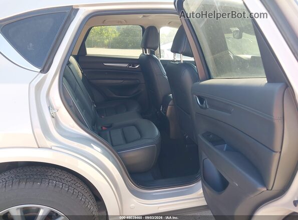 JM3KFBCL0S0620043 2025 MAZDA CX-5 Beige Vista de los asientos traseros