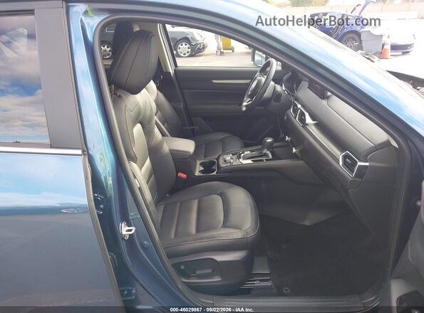 JM3KFBCM6P0229690 2023 MAZDA CX-5 Blue Front interior view