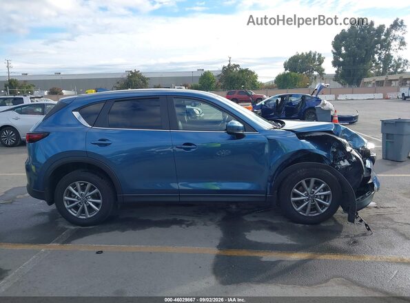 JM3KFBCM6P0229690 2023 MAZDA CX-5 Blue Rear interior view